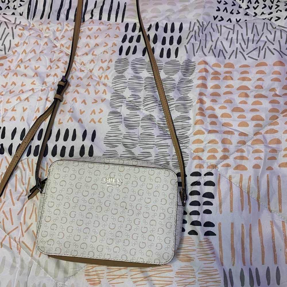 Guess white and tan crossbody purse.